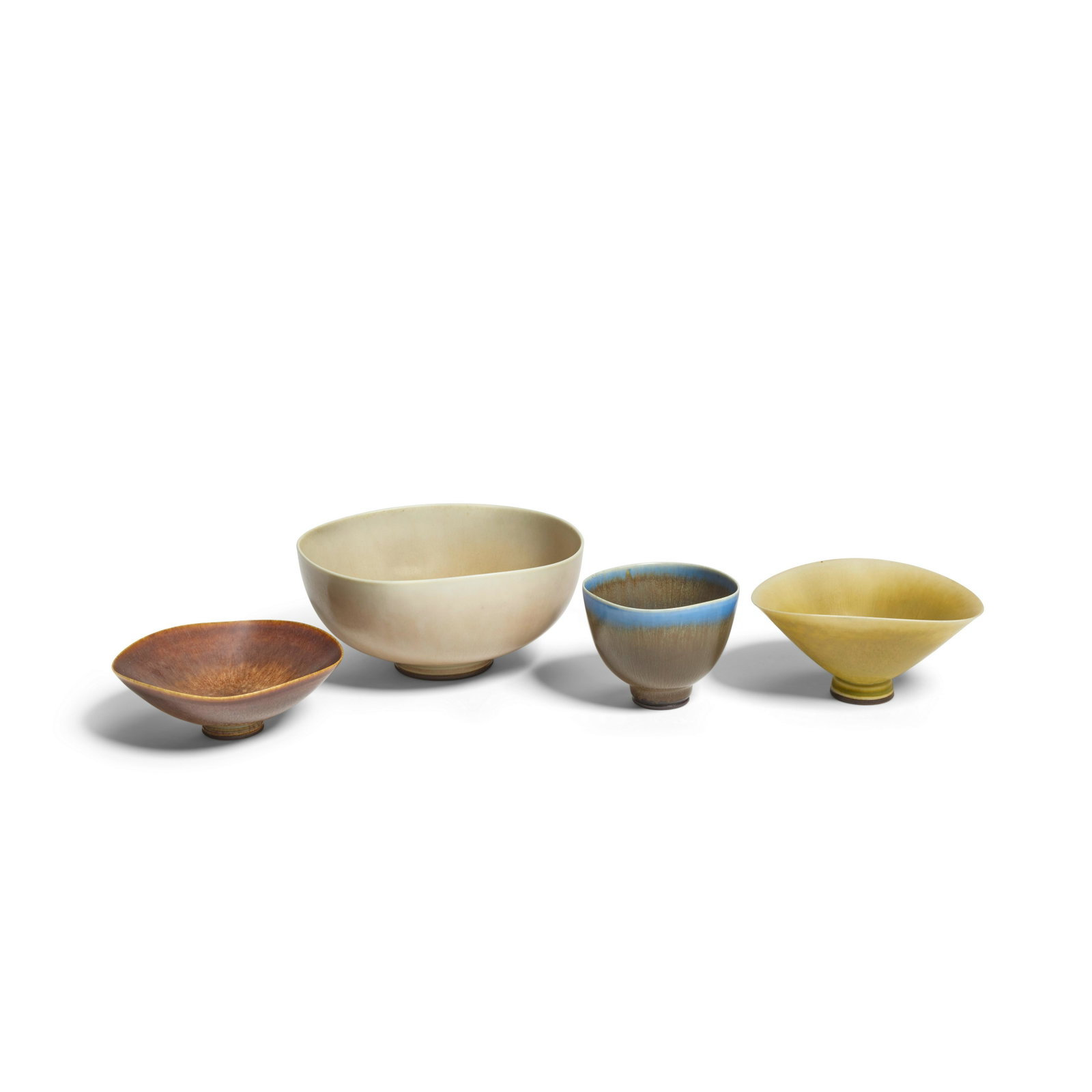 BERNDT FRIBERG (1899-1981) Group of Four Bowlscirca 1960for Gustavsberg, glazed stoneware, each ...: BERNDT FRIBERG (1899-1981) Group of Four Bowls circa 1960 for Gustavsberg, glazed stoneware, each incised 'Friberg' with manufacturer's mark, one bowl with manufacturer's label diameter of largest 5 1