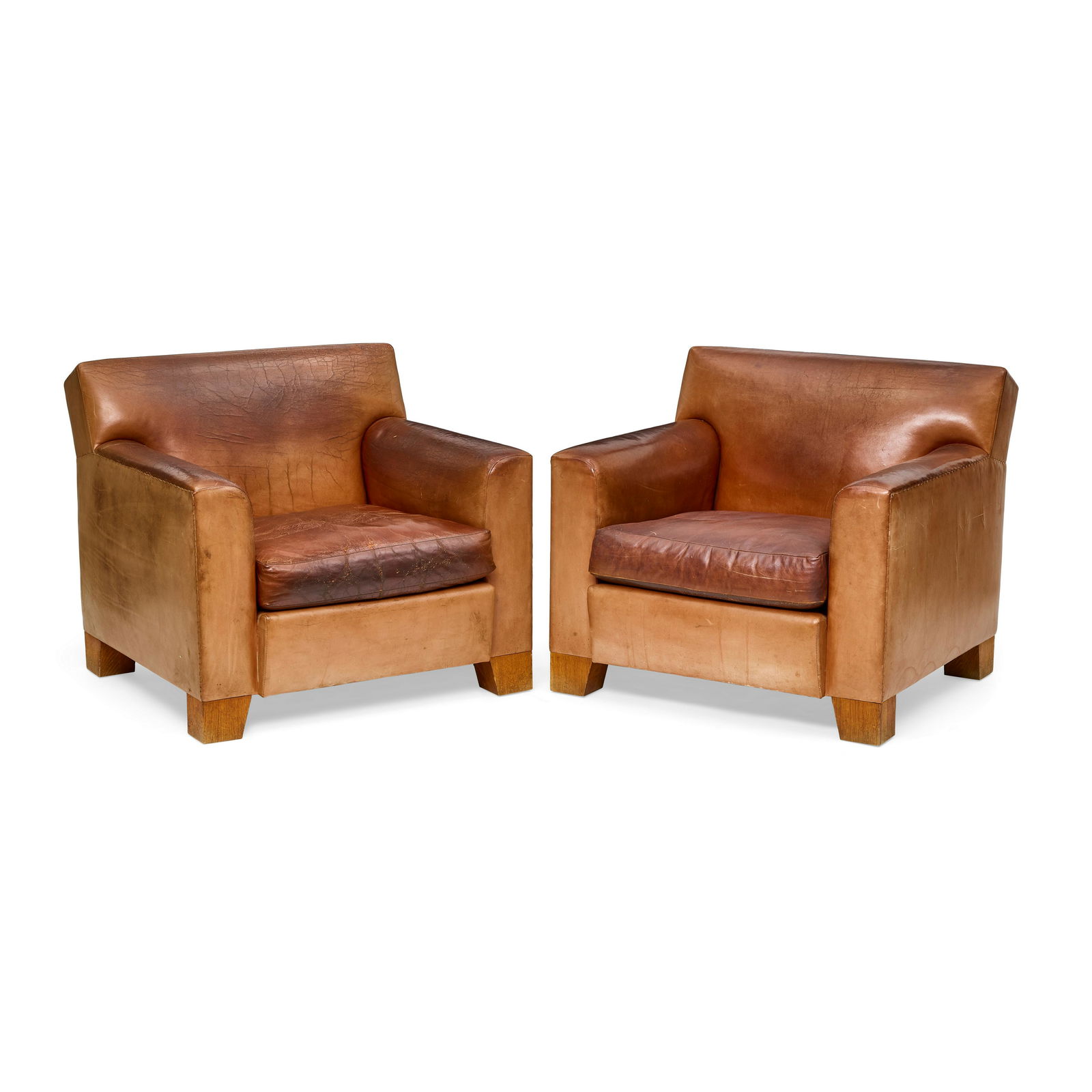 ROY MCMAKIN (BORN 1965) Custom Pair of Club Chairs1990sfor Domestic Furniture Co., leather and o...: ROY MCMAKIN (BORN 1965) Custom Pair of Club Chairs 1990s for Domestic Furniture Co., leather and oak height 32in (81.5cm); width 36in (91.5cm); depth 36in (91.5cm) Footnotes: Provenance Collection of