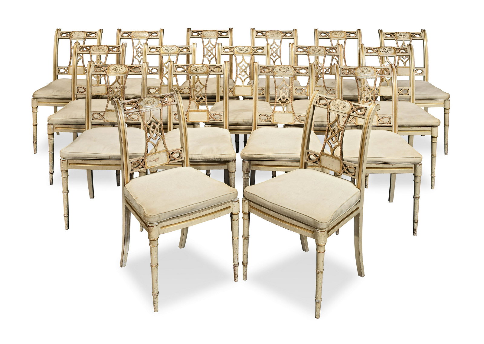 A set of seventeen French painted and parcel gilt dining chairs by Maison Jansen Circa 1938 (17) (1 of 3)
