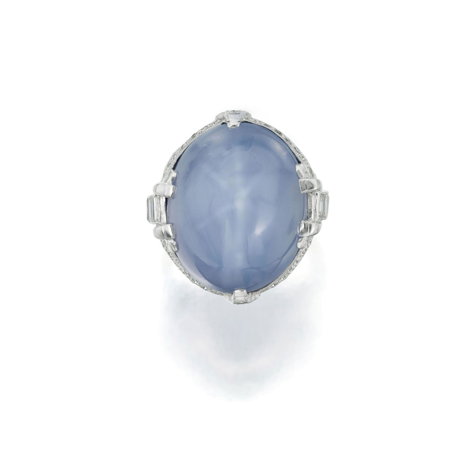 A STAR SAPPHIRE AND DIAMOND RING (1 of 2)