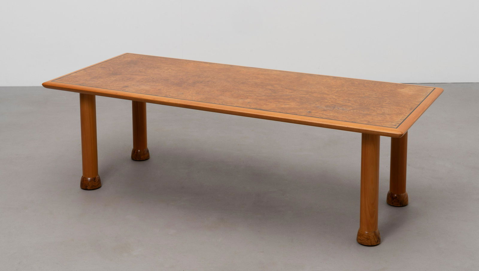 John Makepeace 'Rhapsody II' table, 1999: John Makepeace 'Rhapsody II' table, 1999 Burr elm-veneered wood, burr elm, cherry, bog oak inlay. 40.2 x 120 x 53cm Executed by an apprentice in the John Makepeace Workshop, Parnham House, Dorset, Uni