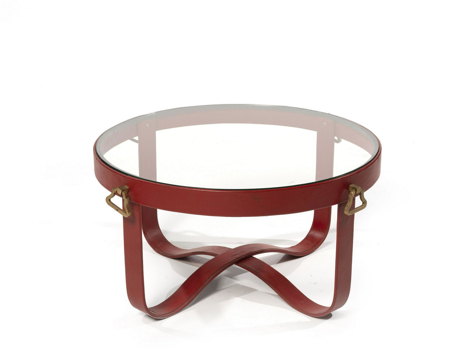 JACQUES ADNET Table bassecréation circa 1940Cuir rouge, laiton et verreH: 43cm.(16 15/16in.... (1 of 2)