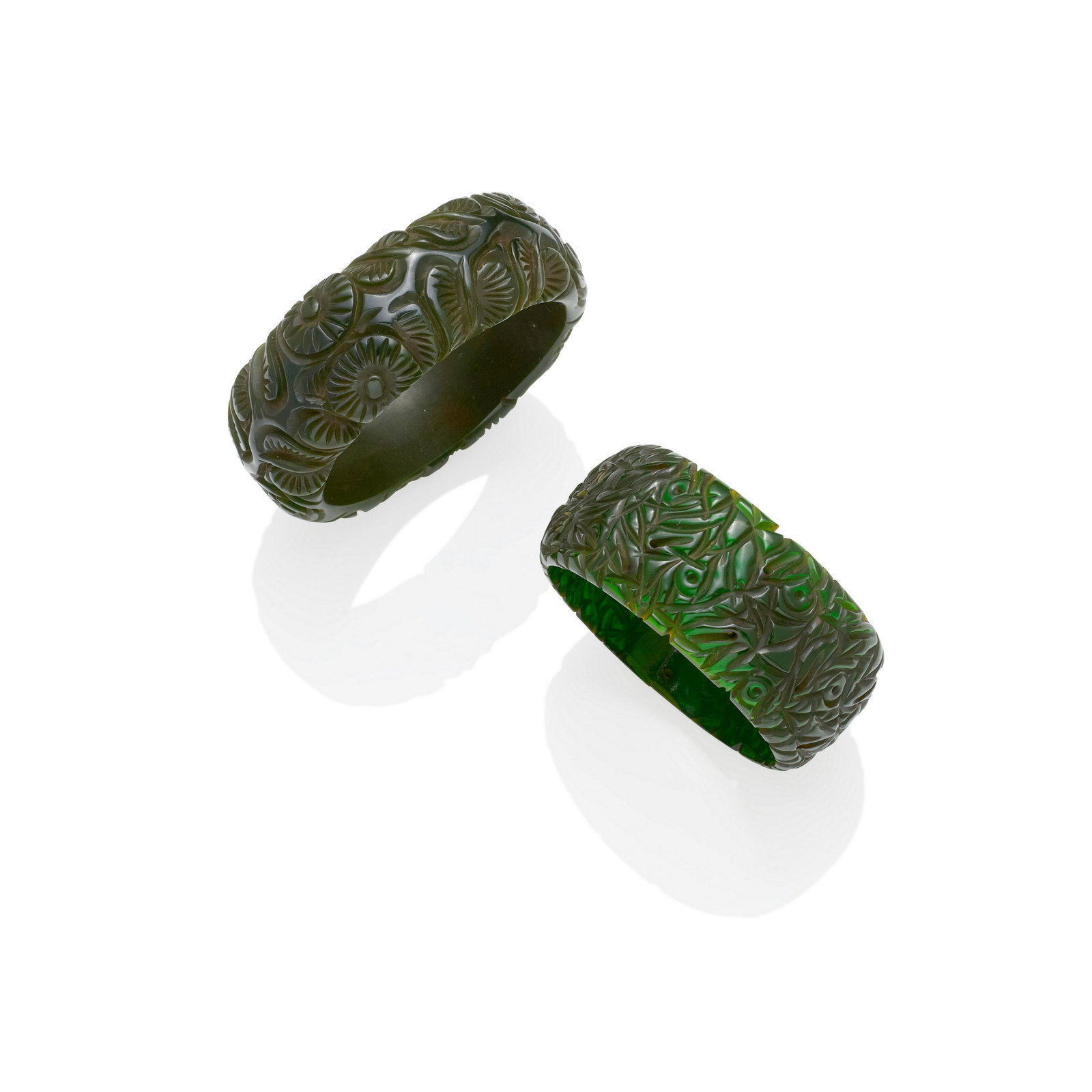 TWO CARVED GREEN BAKELITE BANGLES with foliate designdiameter of each 2 1/2in (6.4cm) (1 of 1)