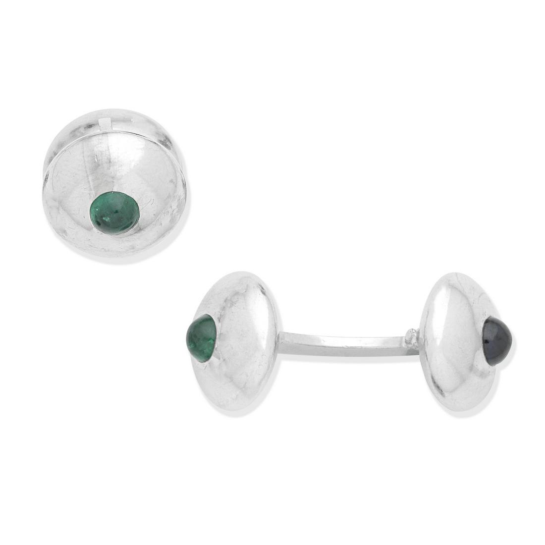 GEORG HORNEMANN: GEM-SET CUFFLINKS: GEORG HORNEMANN: GEM-SET CUFFLINKS Double-sided, each set with an emerald or sapphire cabochon, signed Hornemann, gemstones untested, length of plaque 1.2cm Footnotes: Please note this lot has VAT at