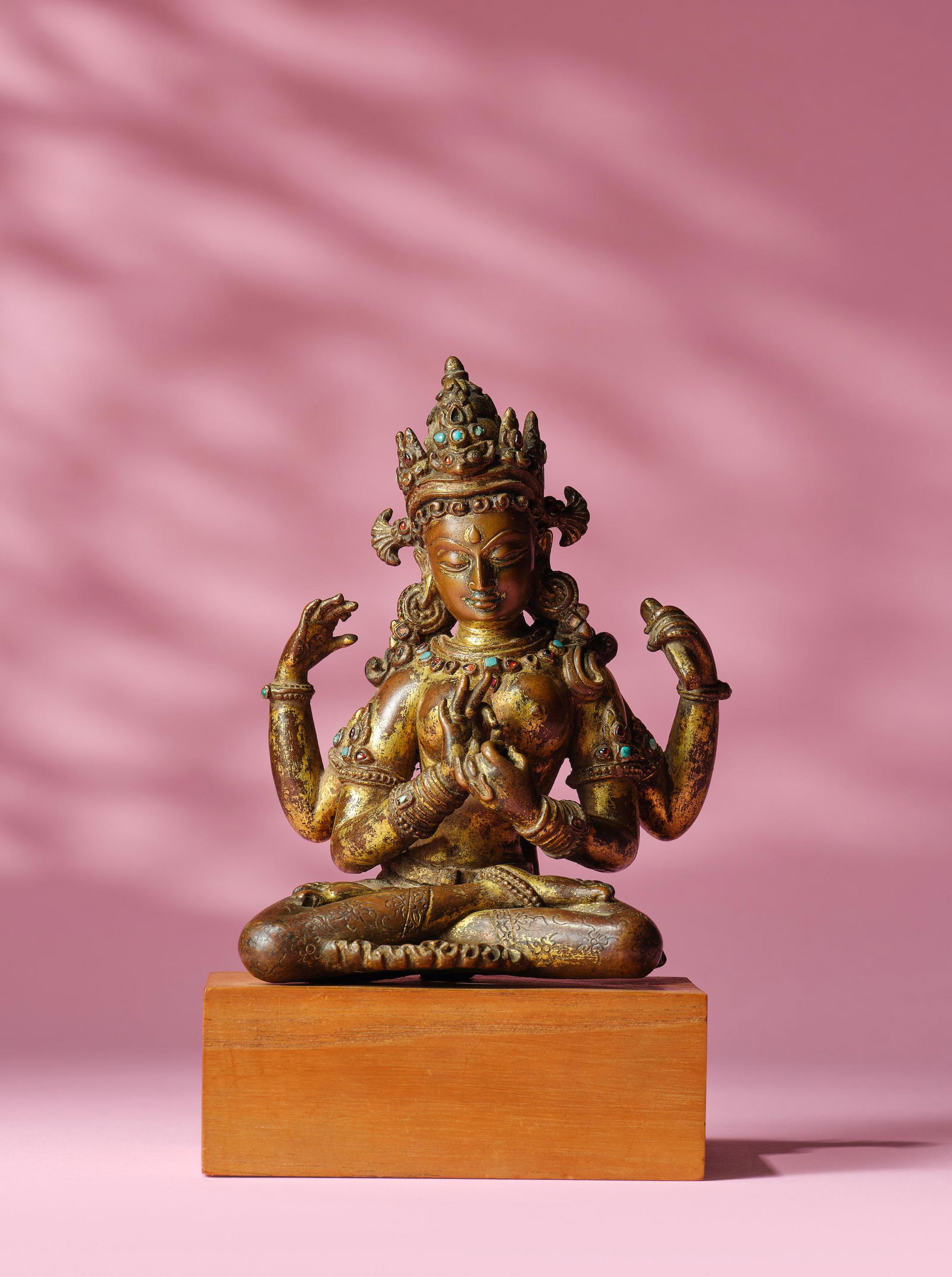 A GILT COPPER ALLOY FIGURE OF PRAJNAPARAMITA NEPAL, EARLY MALLA PERIOD, 13TH CENTURY (1 of 3)