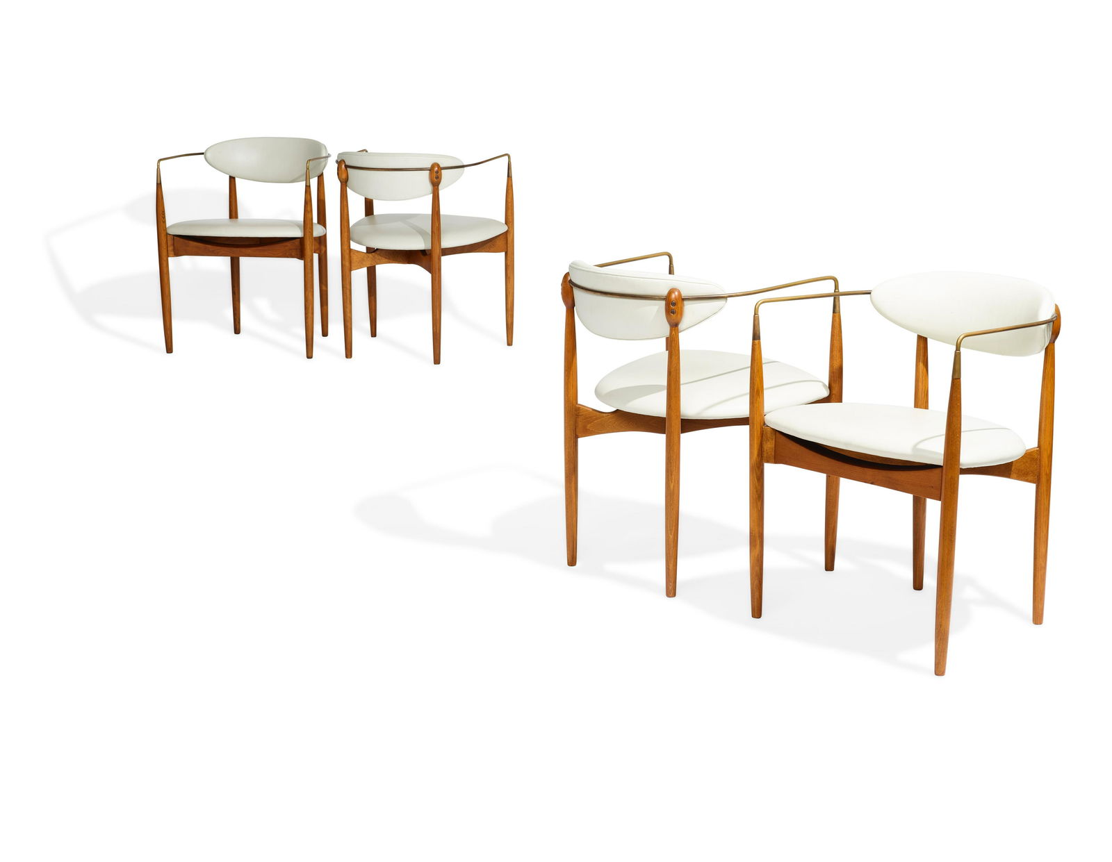 DAN JOHNSON (1918-1979) Set of Four Viscount Chairs1950sfor Selig, walnut, brass, leatherheight ...: DAN JOHNSON (1918-1979) Set of Four Viscount Chairs 1950s for Selig, walnut, brass, leather height of each 27 3/4in (70.5cm); width 21 1/2in (54.6cm); depth 20 1/2in (52.5cm) This lot is subject to th