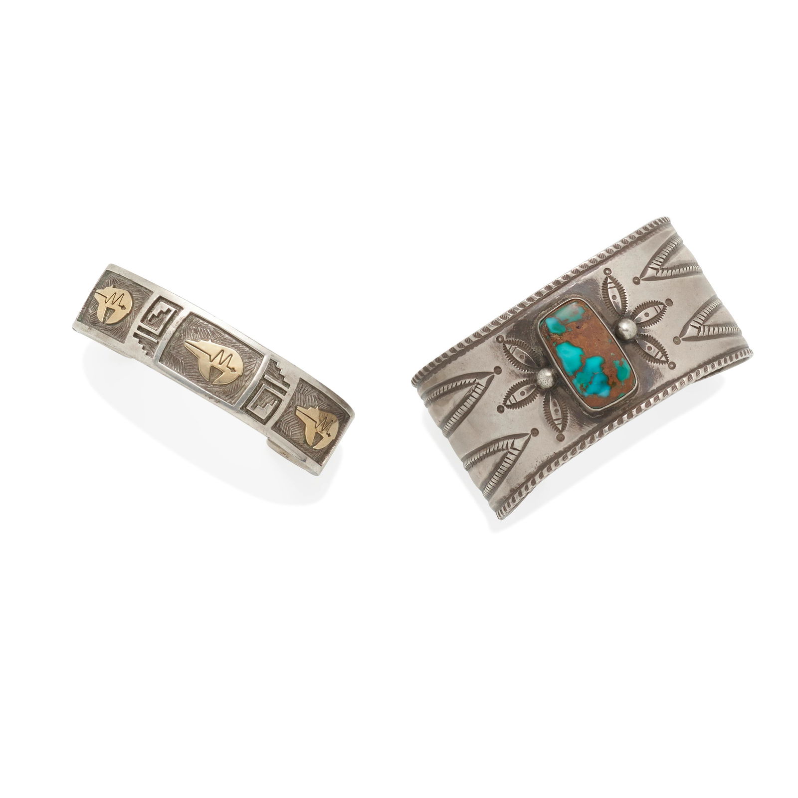 Two Arland F. Ben cuff bracelets: Arland F. Ben Navajo (Diné), (20th/21st century), two cuff bracelets, one in stamped coin silver centering a rectangular turquoise; the other in 14k gold and sterling silver with heartline bear m