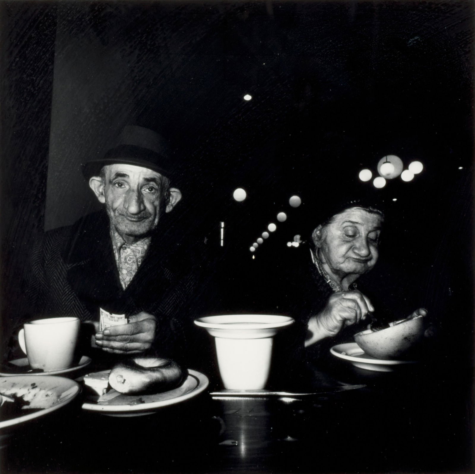 Bruce Davidson (born 1933); Untitled (from 'The Cafeteria');: Bruce Davidson (born 1933) Untitled (from 'The Cafeteria'), 1973 Gelatin silver print; signed in pencil on the verso. 9 x 9 in. (22.8 x 22.8 cm.) sheet 14 x 11 in. (35.6 x 28 cm.) Footnotes: Prov