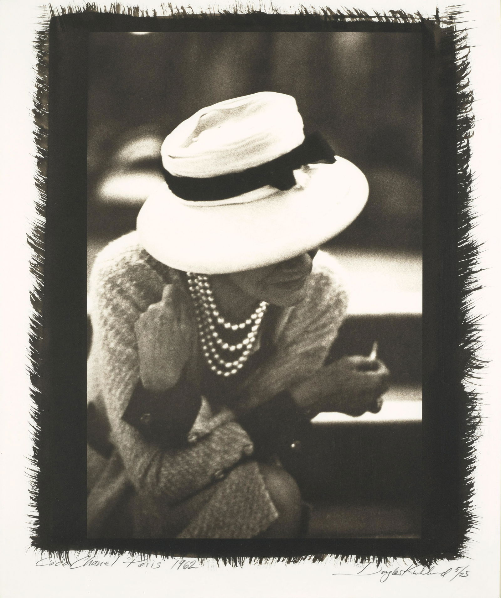 Douglas Kirkland (1934-2022); Coco Chanel, Paris;: Douglas Kirkland (1934-2022) Coco Chanel, Paris, 1962 Platinum print, printed later; signed, titled, dated and numbered '5/25' in pencil in the margin. 23 x 20 in. (58.6 x 50.8 cm.) Footnotes: Proven