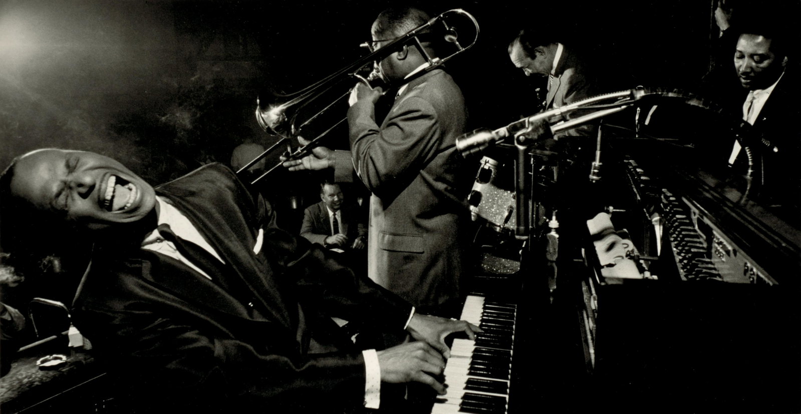 Dennis Stock (1928-2010); Earl Hines;: Dennis Stock (1928-2010) Earl Hines, 1958 Gelatin silver print, printed later; signed in ink in the margin, a Peter Fetterman Gallery label on the frame verso. 10 x 19 in. (25.4 x 48.2 cm.) sheet 16 x