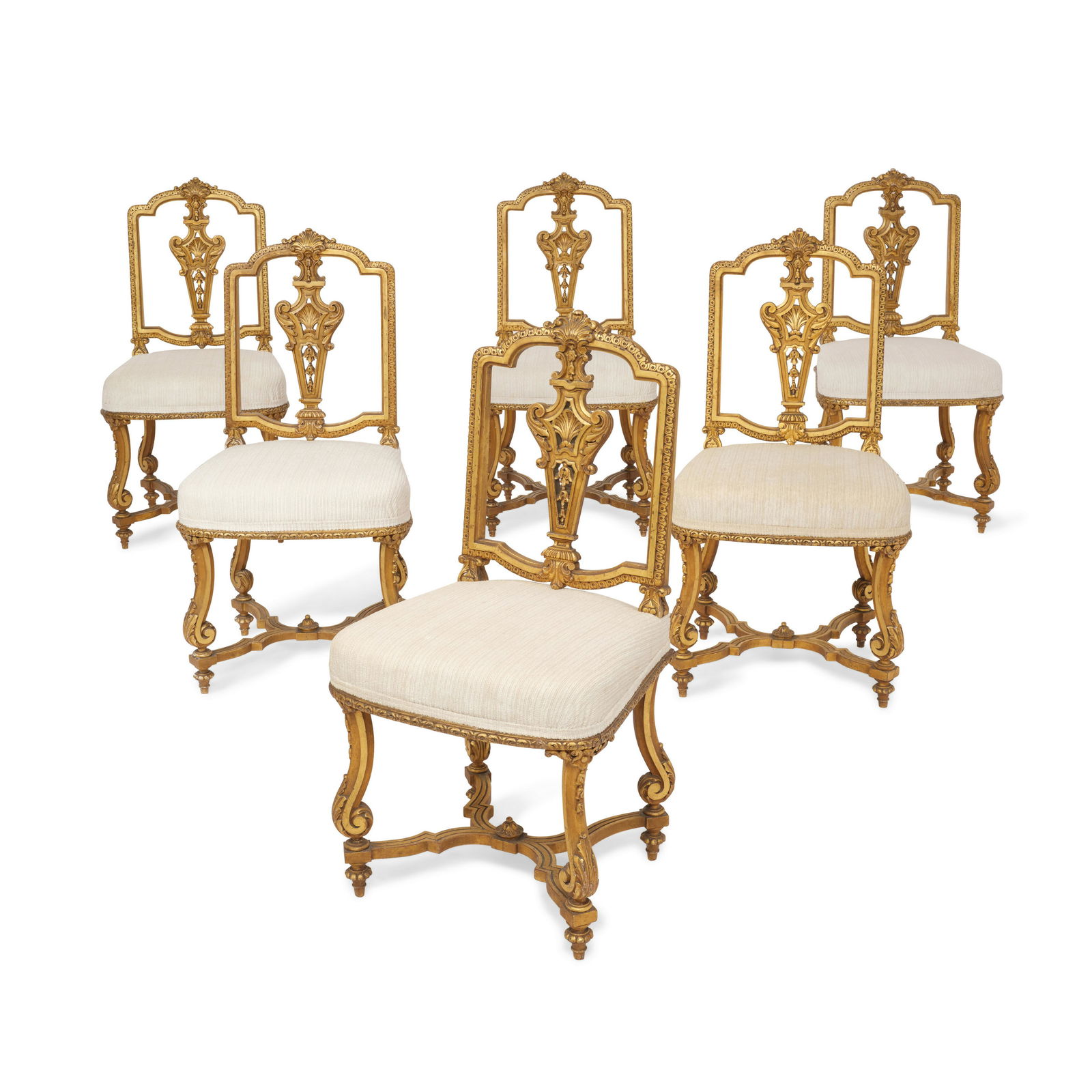 A SET OF SIX LOUIS XIV STYLE CARVED GILTWOOD PETITE CHAISES: A SET OF SIX LOUIS XIV STYLE CARVED GILTWOOD PETITE CHAISES Recently re-upholstered. height 36 1/2in (92.7cm); width 19in (48.3cm); depth 16in (40.6cm) Lot to be sold without reserve.