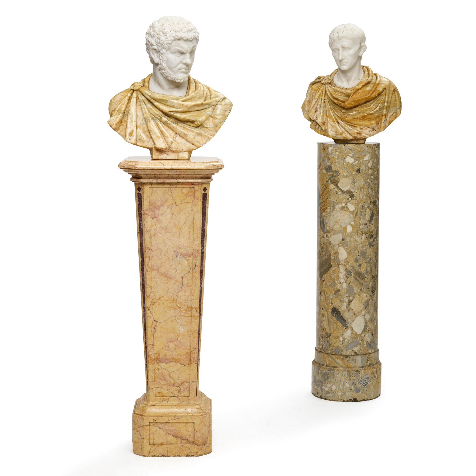 A PAIR OF CARVED MIXED MARBLE BUSTS OF ROMAN FIGURES (1 of 3)
