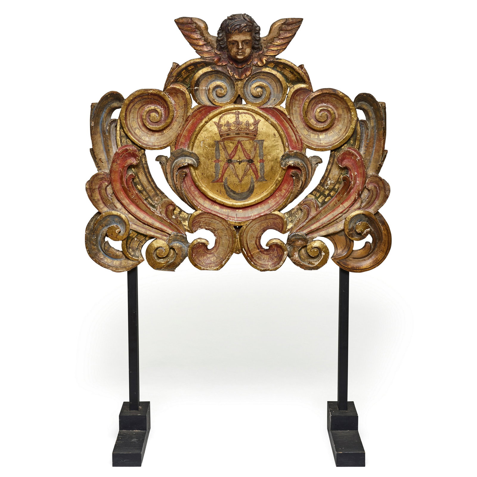 AN ITALIAN CARVED AND POLYCHROMED WOOD ARCHITECTURAL CREST18th century and later (1 of 2)