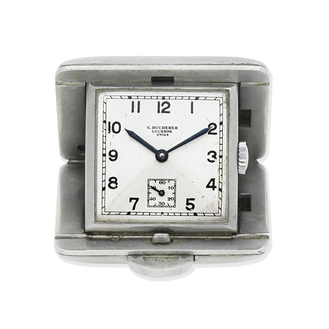 Rolex for C.Bucherer. A stainless steel manual wind purse watch Ref: 3011, Circa 1934: Rolex for C.Bucherer. A stainless steel manual wind purse watch Reference: 3011 Date: Circa 1934 Movement: 15-jewel manual wind Dial: Sectored silvered, black Arabic numeral hour markers, black outer