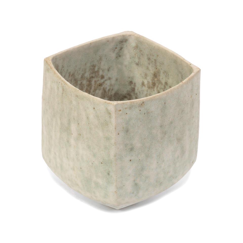 John Ward Squared vessel: John Ward Squared vessel Stoneware, matt mottled white, green and brown glaze. 13.8 cm high Underside with impressed artist's seal. This lot is subject to the following lot symbols: AR AR Goods subjec