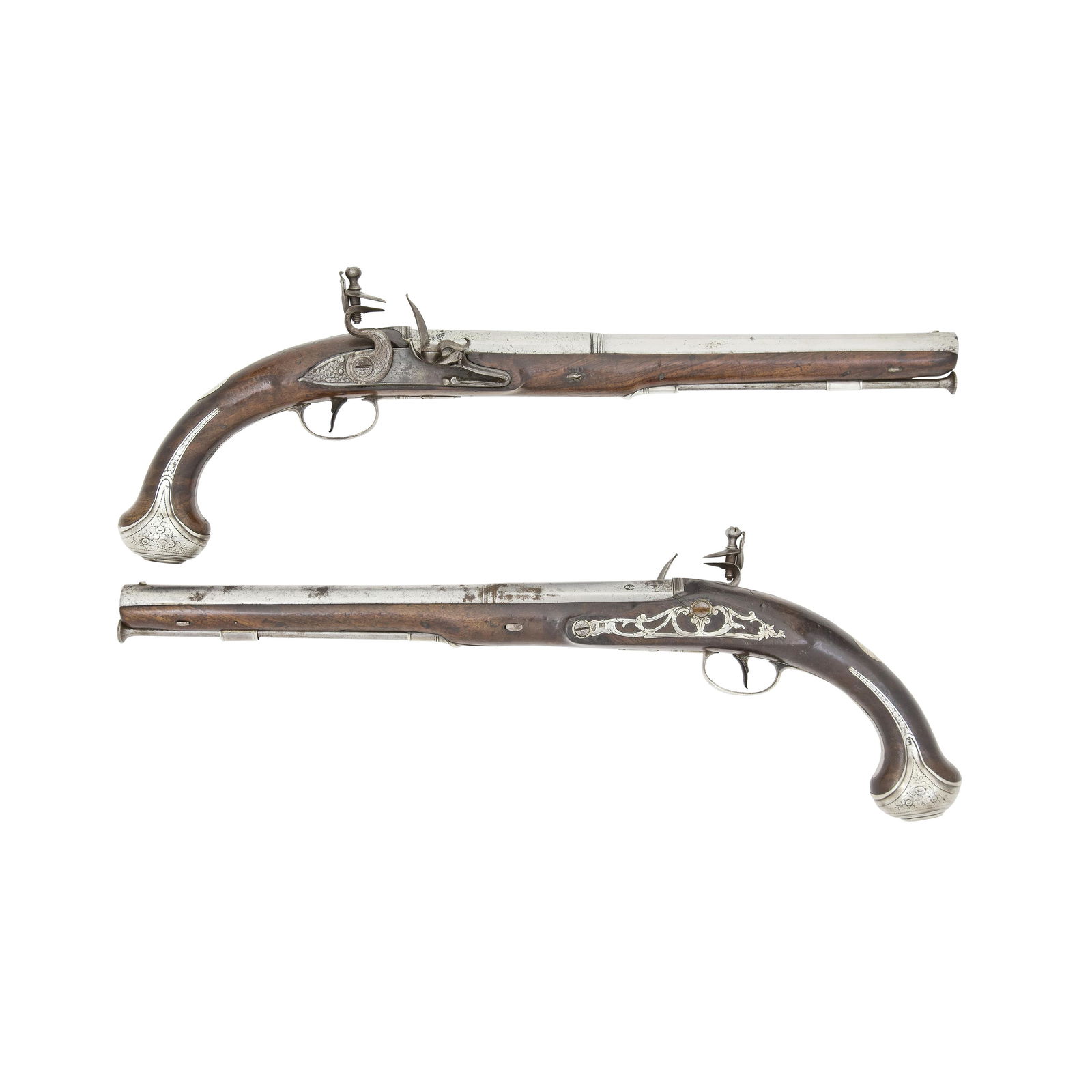 A Rare Pair Of Irish 18-Bore Flintlock Silver-Mounted Duelling Pistols (2): A Rare Pair Of Irish 18-Bore Flintlock Silver-Mounted Duelling PistolsBy Ransford, Dublin, Dublin Silver Marks And Maker's Mark Of Thomas Johnson Or Thomas Jones, Late 18th CenturyWith two-stage barre