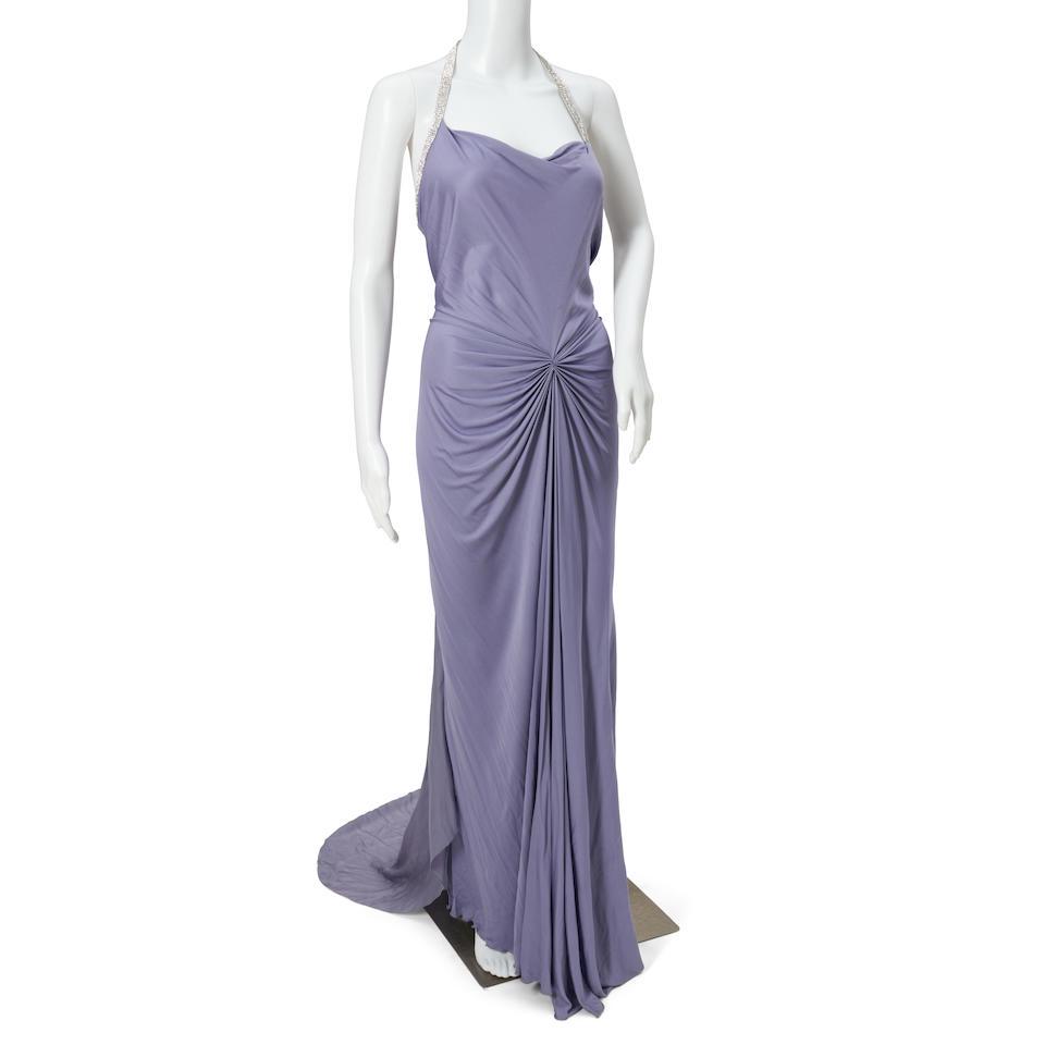 Roberto Cavalli Lavender Silk-blend Gown with Rhinestone Straps: Roberto Cavalli Lavender Silk-blend Gown with Rhinestone Straps The halter-neck dress with slight cowl neck; ruching at the waist; Italian size 38. For further information on this lot please visit Bon