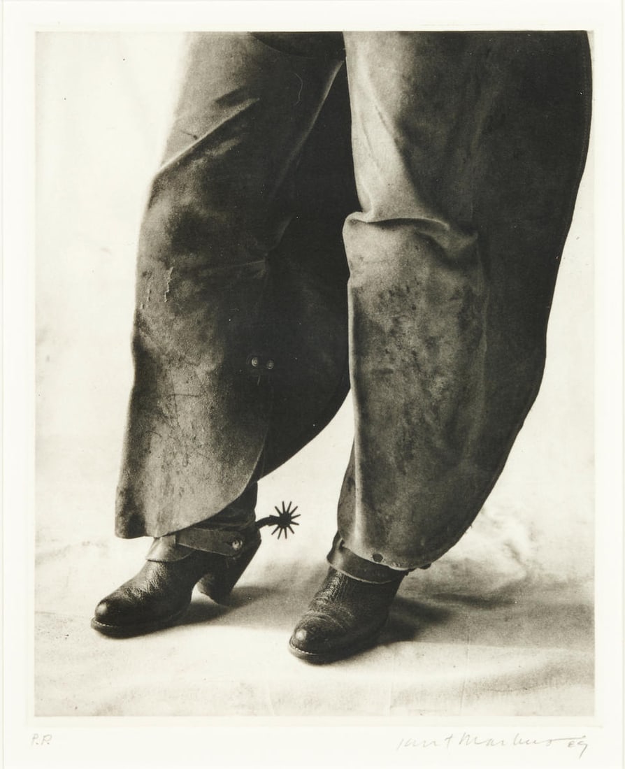 Kurt Markus (born 1947); Batwings, Oro Ranch;: Kurt Markus (born 1947) Batwings, Oro Ranch, 1989 Photogravure; numbered and signed 'P.P....Kurt Markus 89' in pencil along the lower margin; framed. 8 5/16 x 6 3/4 in. (21.1 x 17.2 cm) For further i