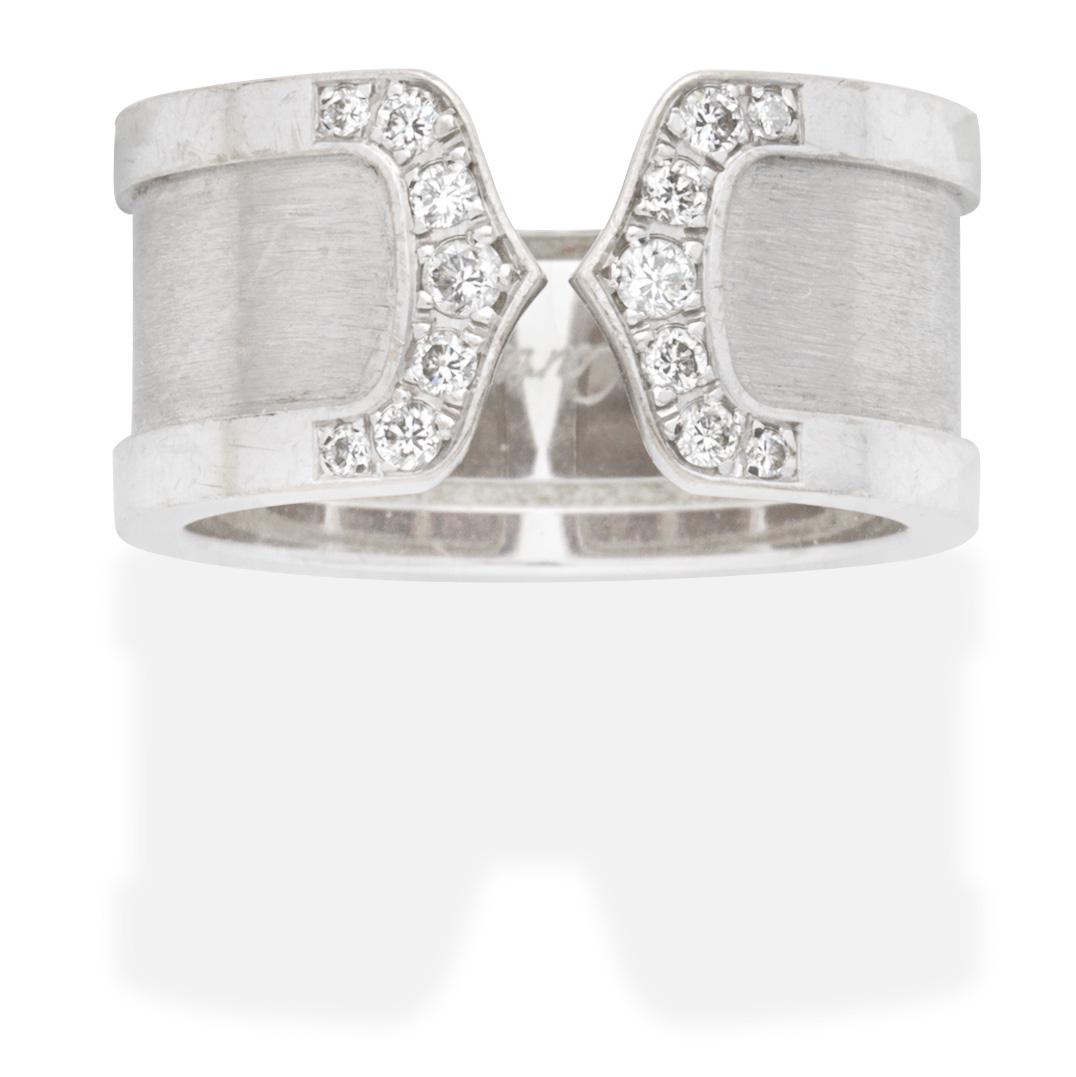CARTIER: DIAMOND-SET 'DOUBLE-C DECOR' RING: CARTIER: DIAMOND-SET 'DOUBLE-C DECOR' RINGSet with brilliant-cut diamonds, signed Cartier, maker's mark, numbered, ring size approx. M