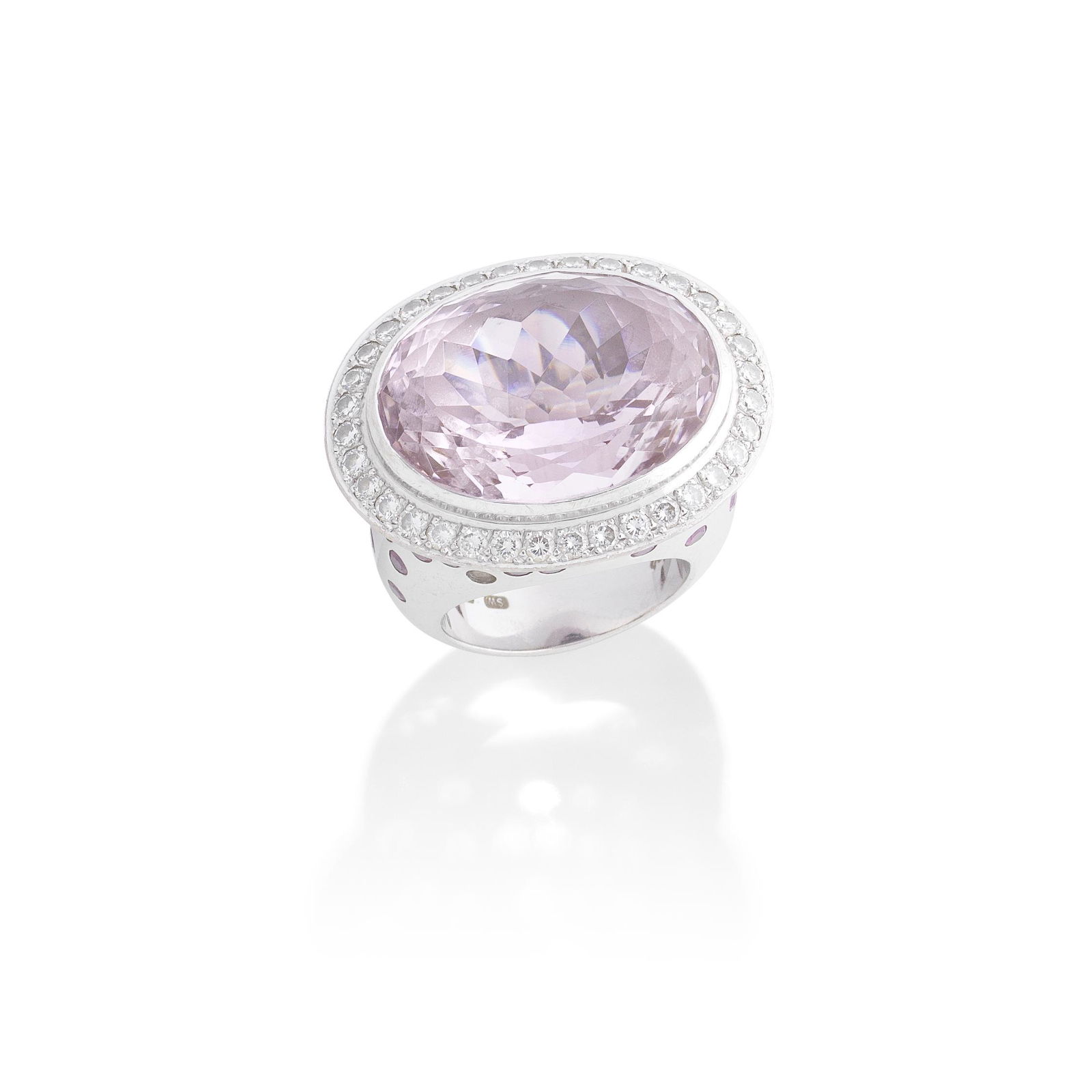 STEPHEN WEBSTER: KUNZITE AND GEM-SET DRESS RING, 2002: STEPHEN WEBSTER: KUNZITE AND GEM-SET DRESS RING, 2002The oval-cut kunzite within a surround of brilliant-cut diamonds, the gallery set with scattered circular-cut pink sapphires, mounted in 18 carat w