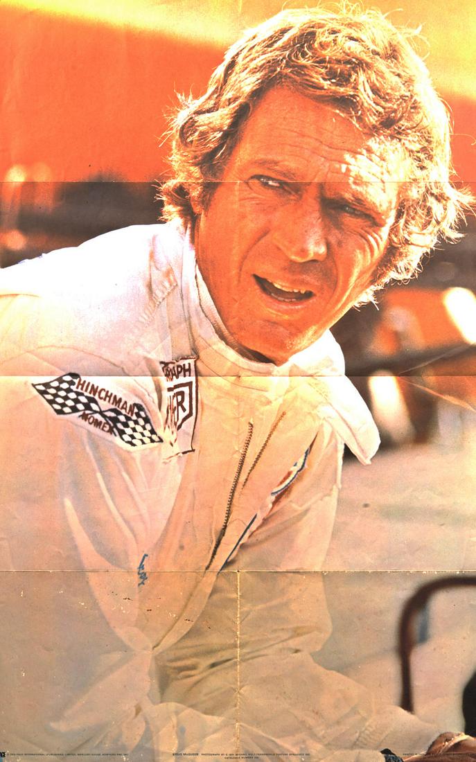 A large Steve McQueen 'Le Mans' promotional poster,: A large Steve McQueen 'Le Mans' promotional poster, depicting Steve McQueen as Michael Delaney looking down the pit-lane, published 1972 by Pace International, small print to bottom reading, 'Steve Mc