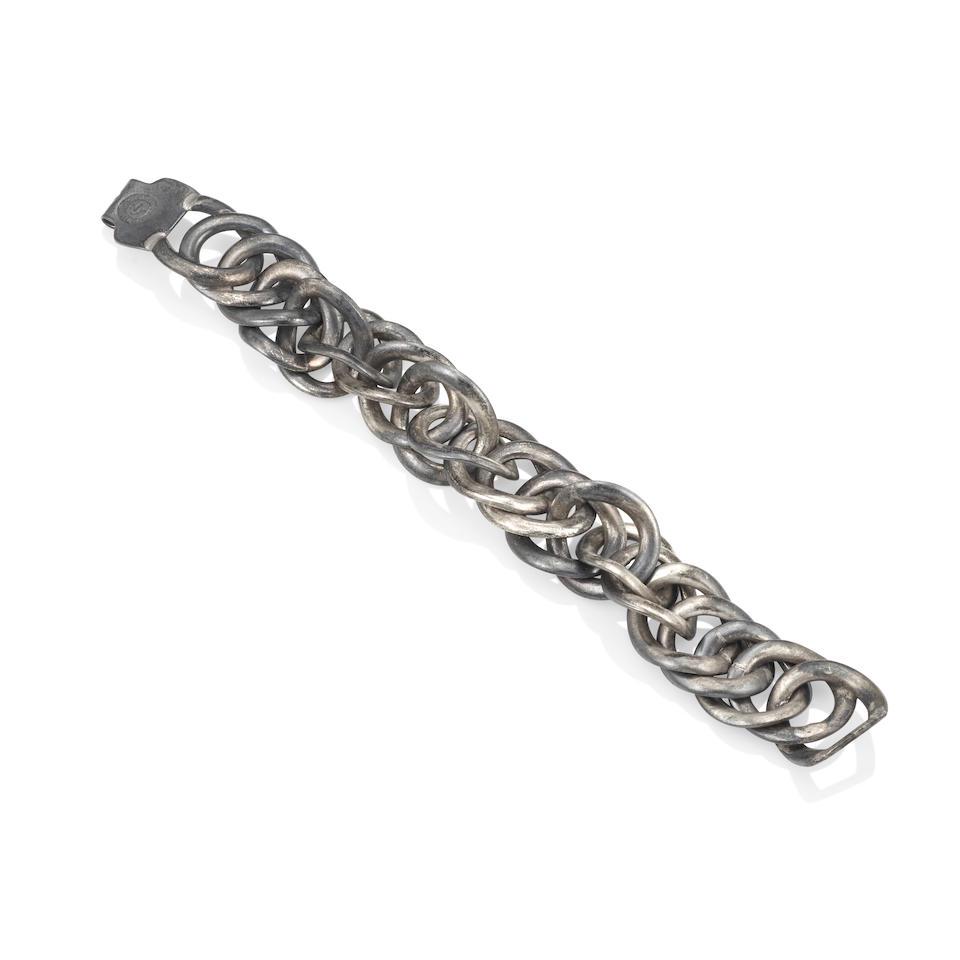 WILLIAM SPRATLING: A SILVER LINK BRACELET: WILLIAM SPRATLING: A SILVER LINK BRACELET Composed of open oval links, signed Spratling, with maker's mark, length 8 in. Footnotes: William Spratling (1900-1967) is acknowledged by many as 'The Father