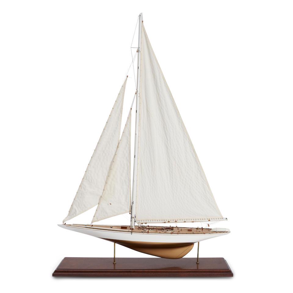 Ship Model of a Cutter Rigged SailboatUnited States, late 20th or early 21st century,: Ship Model of a Cutter Rigged Sailboat United States, late 20th or early 21st century, the model of a modern sailboat with complete rigging and detailed deck features, very good condition, 15cm wide,