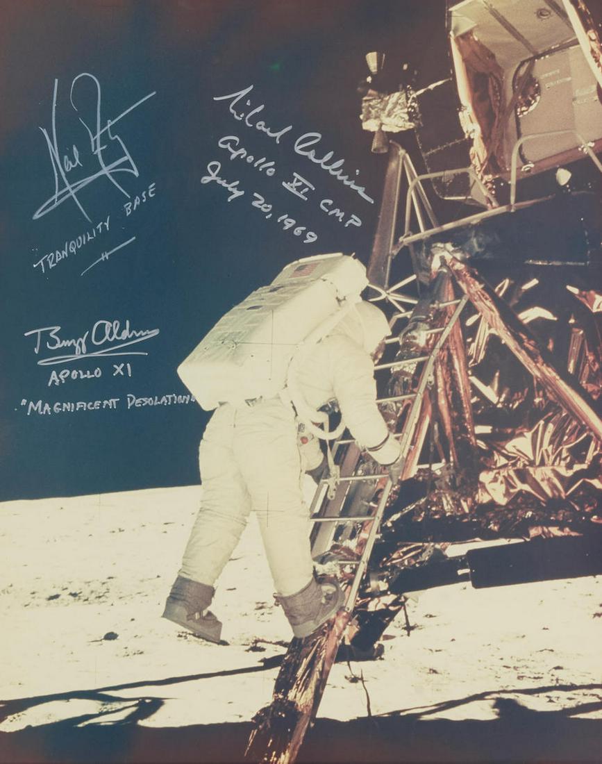 APOLLO 11: LARGE FORMAT GROUP CREW-SIGNED PHOTO OF ALDRIN DESCENDING THE LM LADDER. Large format...: APOLLO 11: LARGE FORMAT GROUP CREW-SIGNED PHOTO OF ALDRIN DESCENDING THE LM LADDER. Large format color photograph, 16 x 20 inches (406 x 508 mm), Framed. SIGNED & INSCRIBED BY THE ENTIRE CREW: NEIL AR