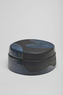 Claire Debril Boîte à couvercle, 1980s: Claire Debril Boîte à couvercle, 1980s Faïence montée de Colombin, émail bleu mat et noir. 9 x 20 x 17.5 cm Marque en creux, aux initiales entrelacées CD. Footnotes: Clai