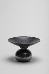 Claire Debril Vase à lèvre évasée, circa 1985: Claire Debril Vase à lèvre évasée, circa 1985 Faïence montée au colombin, émail mat noir. 12 cm, 18 cm Marque en creux, aux initiales entrelacées CD. Footnotes: