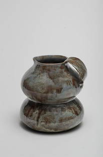 Claire Debril Pichet, circa 1985: Claire Debril Pichet, circa 1985 Faïence montée de Colombin, émail gris-bleu et brun mat. 15.5 cm, 4.5 cm Marque en creux, aux initiales entrelacées CD. Footnotes: Claire Debril Pi