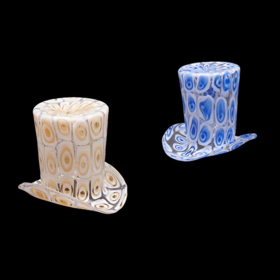 Two Murano Barovier and Toso Glass Top Hat: Two Murano Barovier and Toso Glass Top Hat one with yellow and white, another one with blue and white pattern, ht. to 3 3/4 in. For further information on this lot please visit Bonhams.com