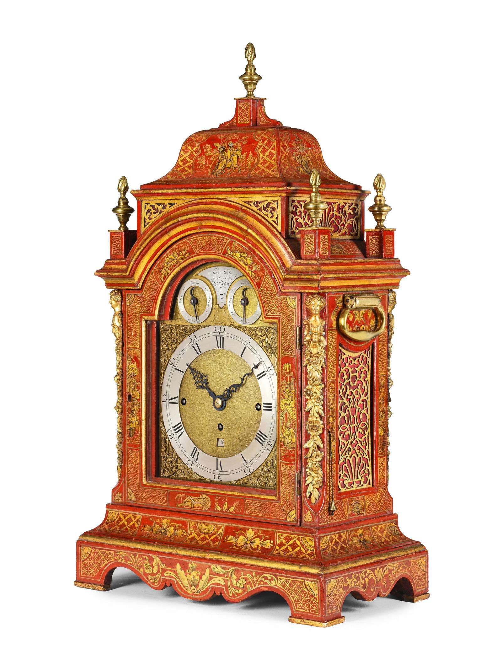 A good mid-late 18th century red chinoiserie decorated musical table clock John Taylor, London: A good mid-late 18th century red chinoiserie decorated musical table clock John Taylor, London The stepped bell-shaped top mounted with five good twisted and facetted urn finials, each on a pedestal o