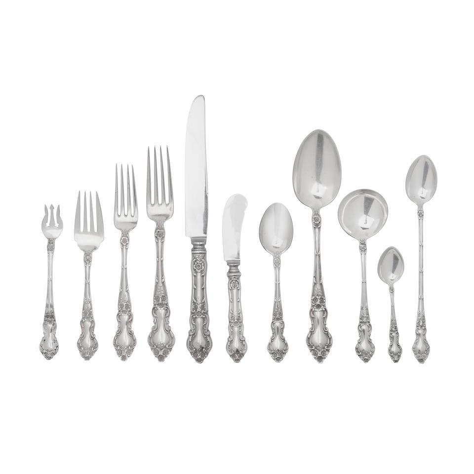 AN AMERICAN STERLING SILVER FLATWARE SERVICE by Wallace Silversmiths, Wallingford, CT, 20th century: AN AMERICAN STERLING SILVER FLATWARE SERVICE by Wallace Silversmiths, Wallingford, CT, 20th century In the Meadow Rose pattern, comprising six dinner forks, twelve cream soup spoons, twelve dinner kni