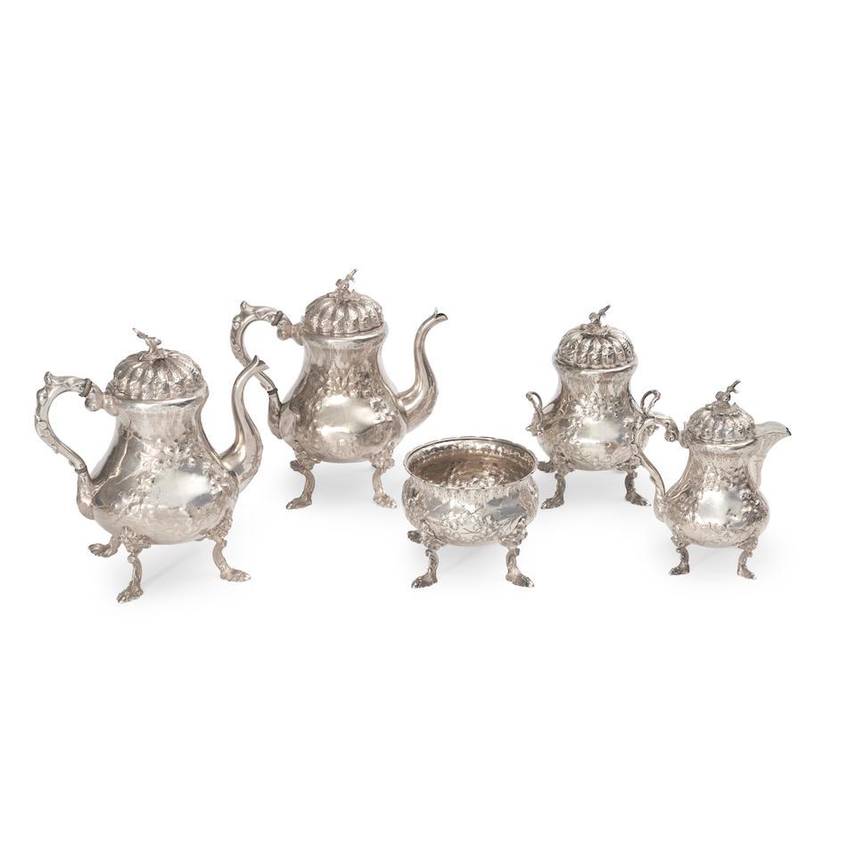 Jones, Shreve, Brown, Co. Silver Coffee and Tea Service,: Jones, Shreve, Brown, Co. Silver Coffee and Tea Service, Boston, circa 1857-60, modeled in a naturalistic style, the covered pieces having lobed lids with chased leaves surmounted by acorn finials, t