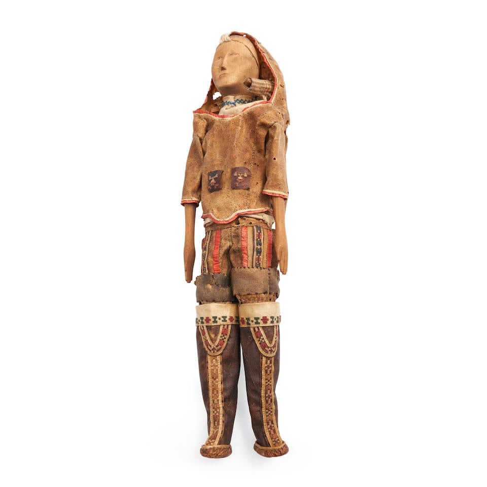 A Greenland Eskimo carved wood doll ht. 14 1/4 in. (1 of 3)