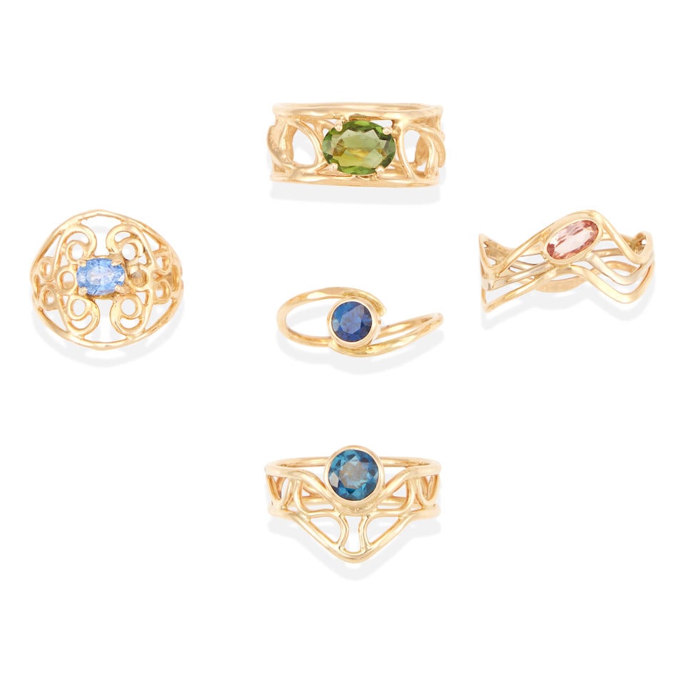 A GROUP OF 14K GOLD AND GEM-SET RINGS: A GROUP OF 14K GOLD AND GEM-SET RINGS • 14k yellow gold • 2 round sapphires, 1 oval sapphire, 1 oval green tourmaline, 1 oval pink topaz • Sizes 5 1/2, 7, 7 3/4 and 8 1/2 • Est