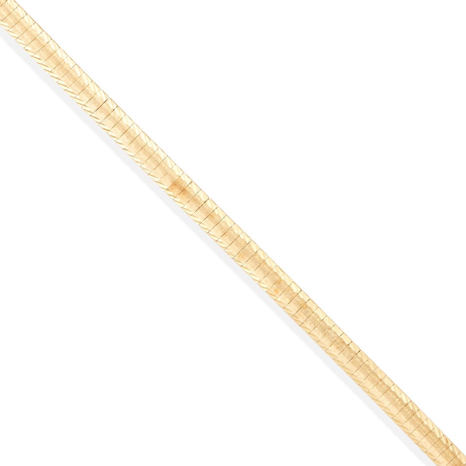 AN 18K GOLD BRACELET (1 of 3)