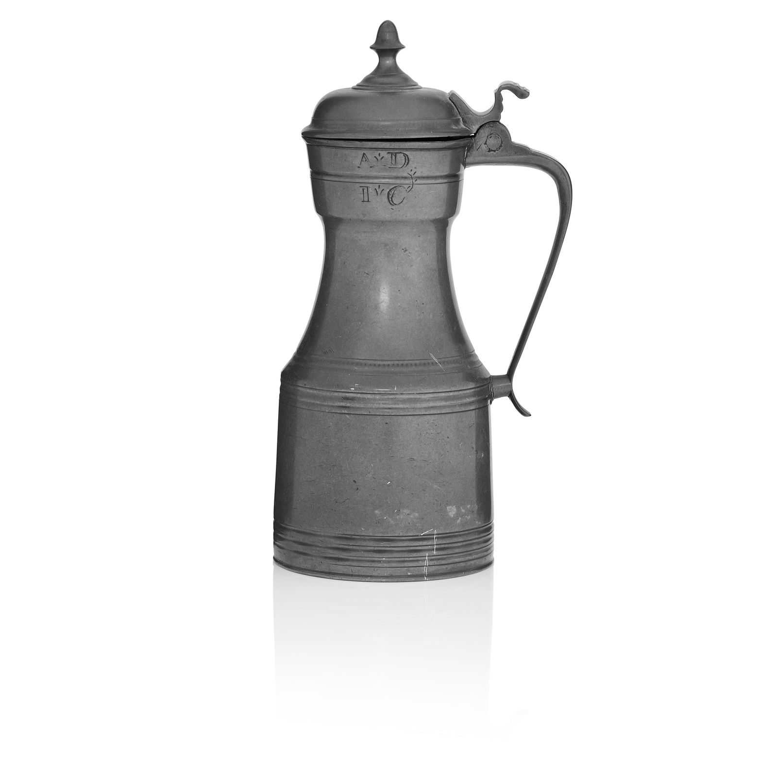 A George III pewter tappit hen, of Scots pint capacity circa 1790: A George III pewter tappit hen, of Scots pint capacity circa 1790 The typical shouldered body with multiple incised lines, and stamped ownership initials 'A D' over 'I C' to collar, knopped lid, capac