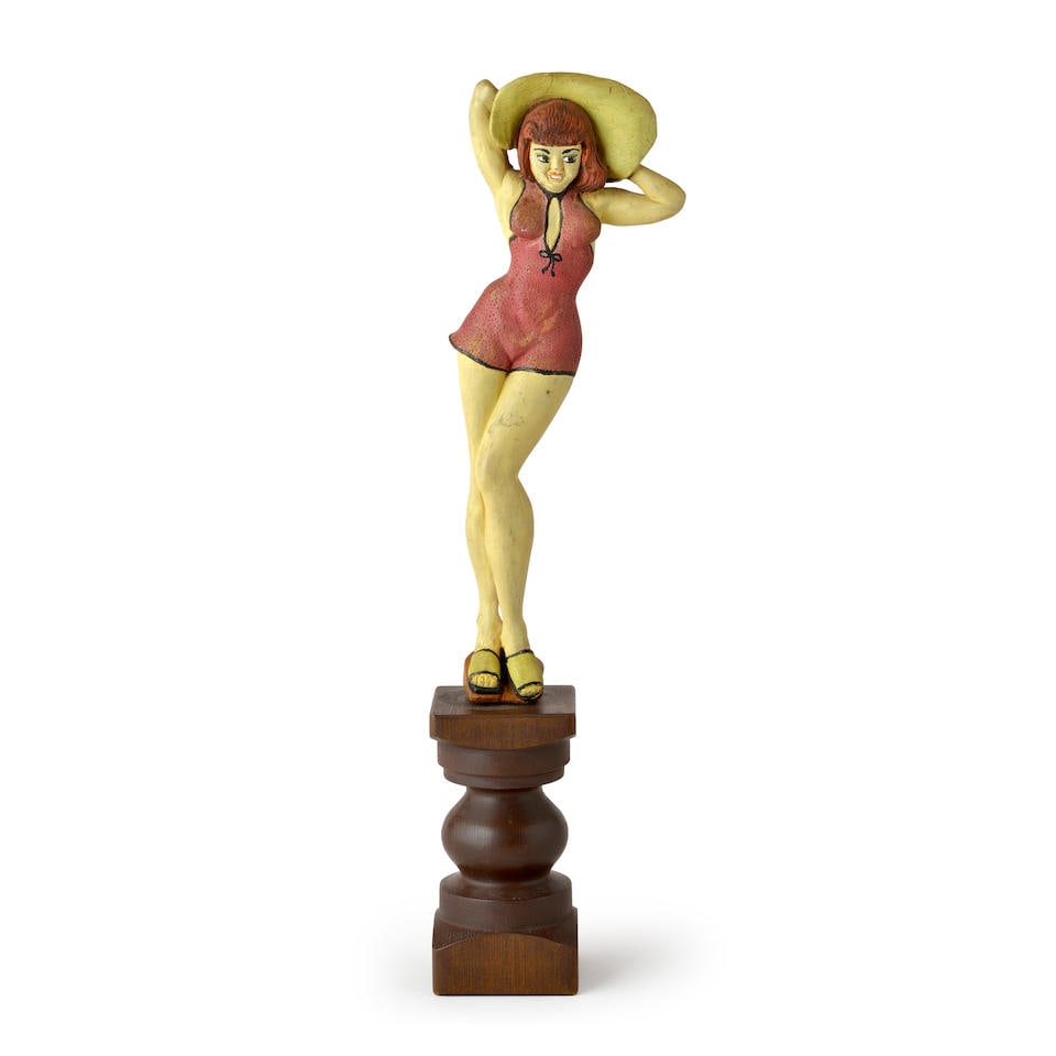 Polychrome Figure of a Woman in Beach Attire United States, c. 1950.: Polychrome Figure of a Woman in Beach Attire United States, c. 1950. Polychrome figure depicting woman in bathing suit and sandals holding on to large sunhat, on integral domed pedestal inscribed 'NIX