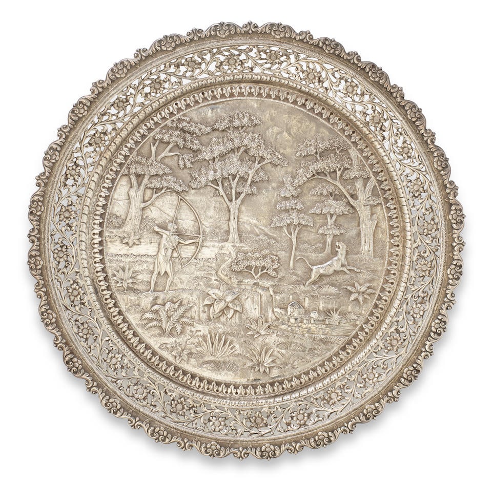 A Kutch repoussé silver footed tray Western India, circa 1890 (1 of 3)