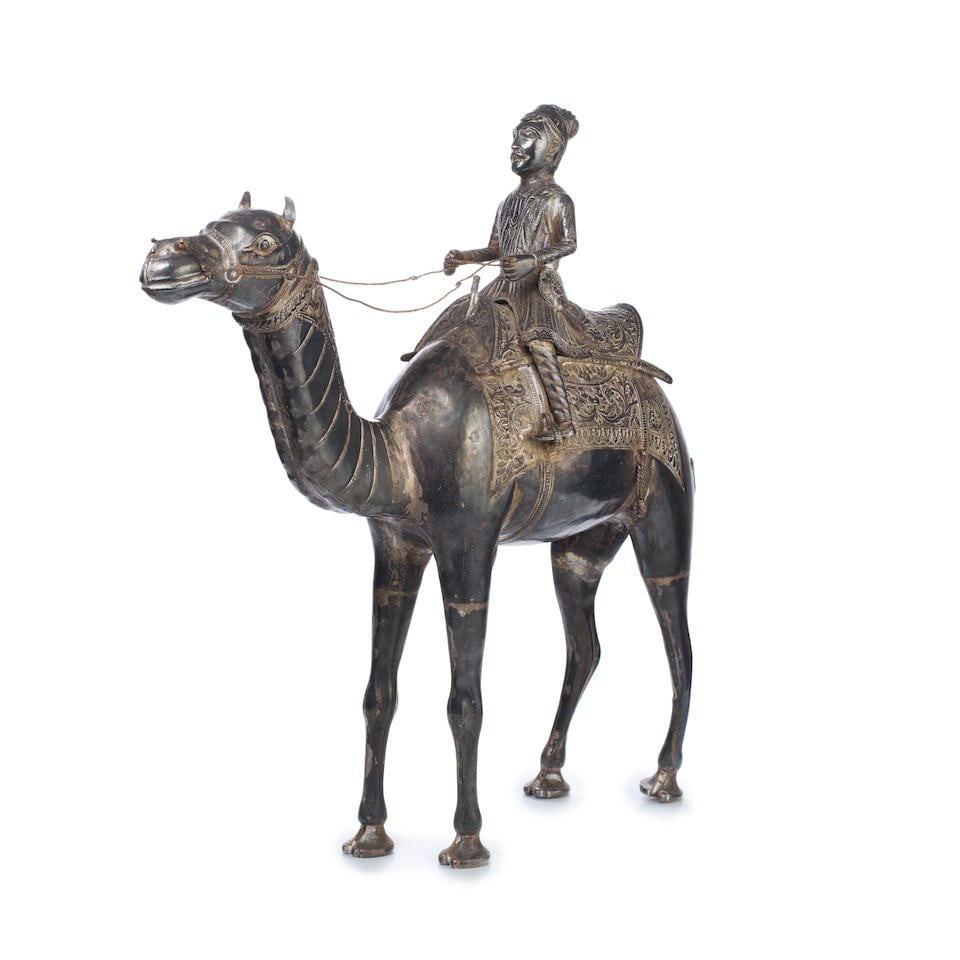 A silver-plated model of a camel and rider India, 19th/ 20th Century (1 of 2)