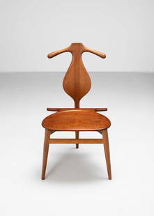 Hans J. Wegner Valet chair, model no. 540, designed 1953: Hans J. Wegner Valet chair, model no. 540, designed 1953 Teak, oak, leather, brass. 94.7 x 50 x 50.5 cm Executed by master cabinetmaker Johannes Hansen, Copenhagen, Denmark. Underside impressed with m