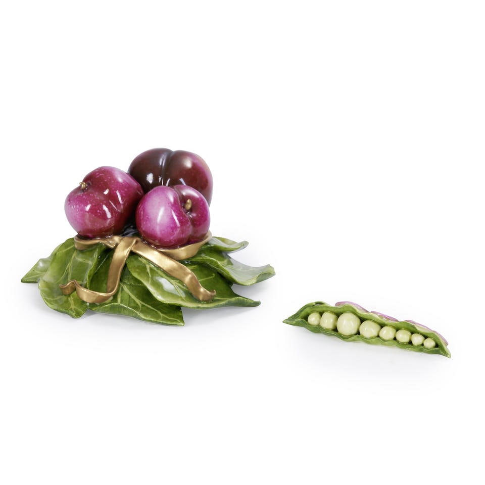 KATHERINE HOUSTON CERAMIC PLUMS AND A PEAPOD: KATHERINE HOUSTON CERAMIC PLUMS AND A PEAPOD • United States of America • 1997 • Signed 'KHO' and dated '97' on the base • 2 3/4' height (plums) • 5' width (plums) •