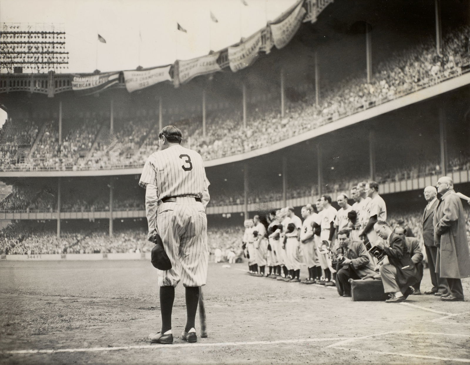 Nat Fein (1914-2000); The Babe Bows Out;: Nat Fein (1914-2000) The Babe Bows Out, 1948 Ferrotyped gelatin silver print; a 'Herald Tribune - Fein' stamp and a Herald Tribune reproduction limitation stamp on the reverse. 7 1/2 x 9 1/2 in. (19.1