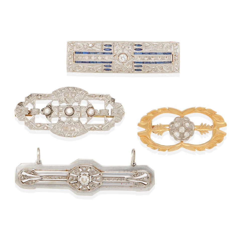 A GROUP OF PLATINUM-TOPPED GOLD, BI-COLOR GOLD, SAPPHIRE AND DIAMOND BROOCHES: A GROUP OF PLATINUM-TOPPED GOLD, BI-COLOR GOLD, SAPPHIRE AND DIAMOND BROOCHES • Platinum, 14k white gold, 18k yellow gold • 5 old European-cut, 1 old-mine cut and numerous rose-cut diamond