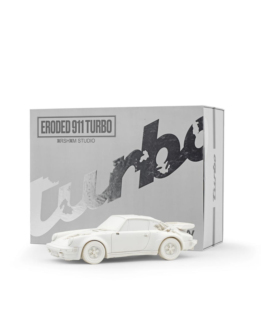 Daniel Arsham (born 1980) Eroded 911 Turbo Porsche, 2020 13.6 x 31 x 9.1cm (5 1/8 x 11 1/8 x 3 1...: Daniel Arsham (born 1980) Eroded 911 Turbo Porsche, 2020 numbered 404/500 on the holographic label on the box cast multiple in selenite with quartz crystals 13.6 x 31 x 9.1cm (5 1/8 x 11 1/8 x 3 1/2in