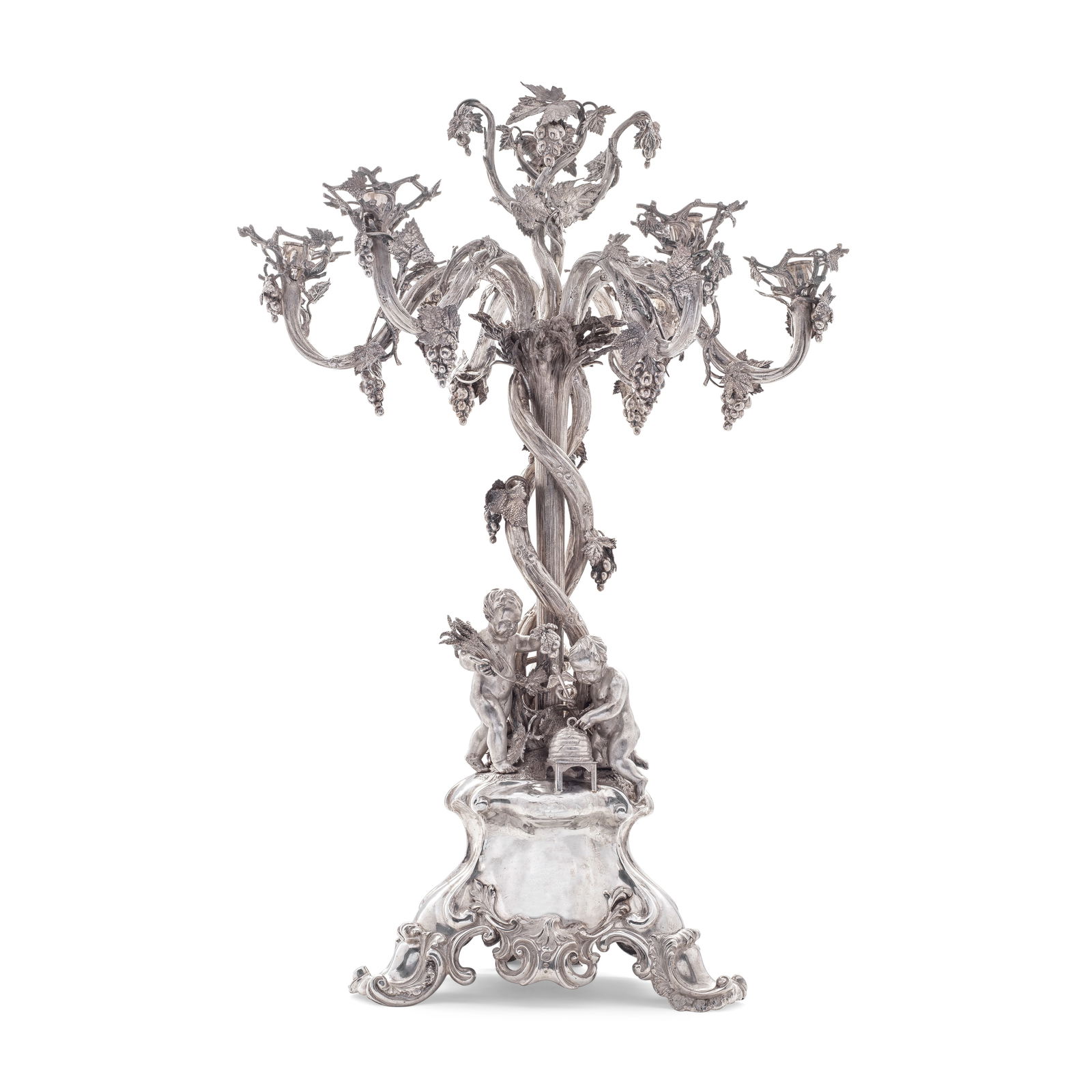 A monumental Victorian silver six-light candelabrum centrepiece Stephen Smith and William Nichol...: A monumental Victorian silver six-light candelabrum centrepiece Stephen Smith and William Nicholson, London 1854 The twisting central fruiting vine stem leading to six separate scrolling branches, al