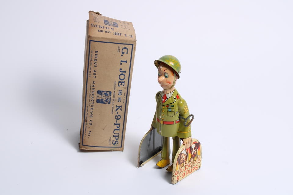 A 'G.I. Joe and his K-9-Pups', tinplate clockwork toy by Unique Art Manufacturing Co, American, ... (1 of 1)