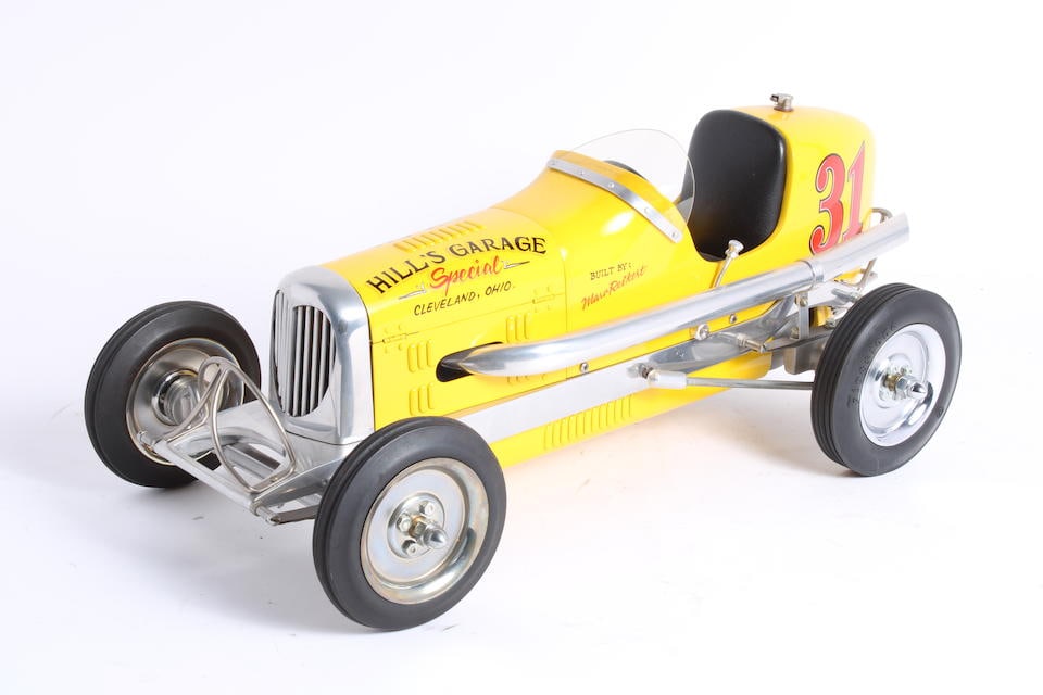 A gas powered tether race car 'Hill's Garage Special' based upon the Synchro Rocket: A gas powered tether race car 'Hill's Garage Special' based upon the Synchro Rocket Modern, polished alloy chassis fitted with Dennymite engine, the undertray and bodywork, well-modelled and detailed